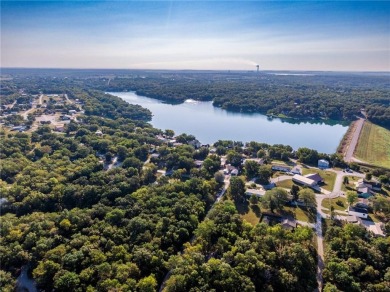 Great location for this treed recreational building lot in Linn on Linn Valley Lakes - Deer Trace Golf Course in Kansas - for sale on GolfHomes.com, golf home, golf lot