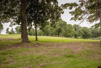 Beautifully updated 4 bedroom, 2 bathroom home in Village Green on Twin Lakes Golf Club in Arkansas - for sale on GolfHomes.com, golf home, golf lot