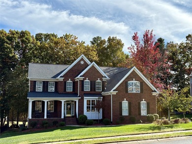 Welcome to this full-brick custom home in the sought-after Olde on Olde Sycamore Golf Plantation in North Carolina - for sale on GolfHomes.com, golf home, golf lot