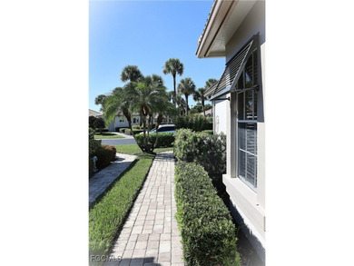 GOLF COURSE & WATERFRONT VIEWS! Welcome to this beautifully on Estero Country Club in Florida - for sale on GolfHomes.com, golf home, golf lot