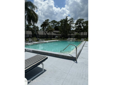 Charming 2 bedroom 2 bath home in the highly sought after gated on The Club At Pelican Bay - South Course in Florida - for sale on GolfHomes.com, golf home, golf lot