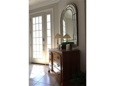 GOLF COURSE & WATERFRONT VIEWS! Welcome to this beautifully on Estero Country Club in Florida - for sale on GolfHomes.com, golf home, golf lot