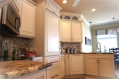 GOLF COURSE & WATERFRONT VIEWS! Welcome to this beautifully on Estero Country Club in Florida - for sale on GolfHomes.com, golf home, golf lot