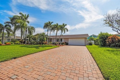 Tropical Paradise in Beautiful Vina Del Mar! Embrace the coastal on Isla Del Sol Yacht and Country Club in Florida - for sale on GolfHomes.com, golf home, golf lot