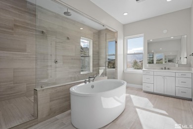 This magnificent 4-bedroom, 3.5-bathroom home in the prestigious on Somersett Country Club in Nevada - for sale on GolfHomes.com, golf home, golf lot