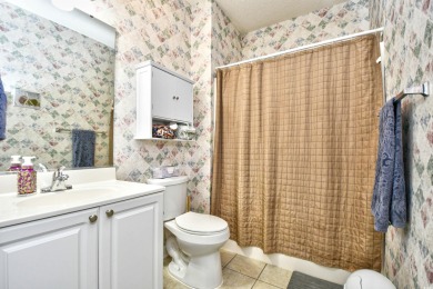 Welcome to your dream ground-floor retreat in the heart of on Barefoot Resort and Golf Club  in South Carolina - for sale on GolfHomes.com, golf home, golf lot