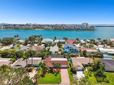 Tropical Paradise in Beautiful Vina Del Mar! Embrace the coastal on Isla Del Sol Yacht and Country Club in Florida - for sale on GolfHomes.com, golf home, golf lot