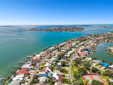Tropical Paradise in Beautiful Vina Del Mar! Embrace the coastal on Isla Del Sol Yacht and Country Club in Florida - for sale on GolfHomes.com, golf home, golf lot