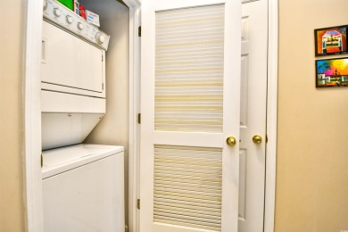 Welcome to your dream ground-floor retreat in the heart of on Barefoot Resort and Golf Club  in South Carolina - for sale on GolfHomes.com, golf home, golf lot