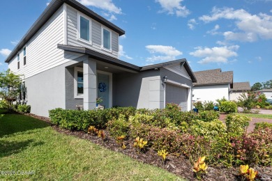 Better than new! Waterfront! This 4/2.5 stunning home with a on LPGA International Golf Course in Florida - for sale on GolfHomes.com, golf home, golf lot