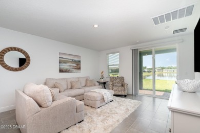 Better than new! Waterfront! This 4/2.5 stunning home with a on LPGA International Golf Course in Florida - for sale on GolfHomes.com, golf home, golf lot