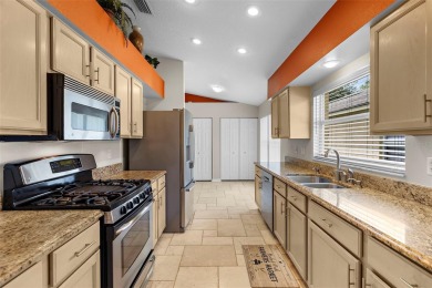 Welcome Home to this stunning Valrico GEM nestled in the highly on Bloomingdale Golfers Club in Florida - for sale on GolfHomes.com, golf home, golf lot