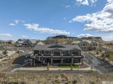 This magnificent 4-bedroom, 3.5-bathroom home in the prestigious on Somersett Country Club in Nevada - for sale on GolfHomes.com, golf home, golf lot