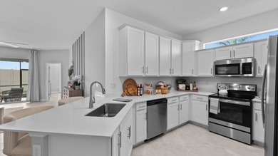 Welcome to Ibis Landing-a true golfer's paradise in Lehigh Acres on Copperhead Golf Club in Florida - for sale on GolfHomes.com, golf home, golf lot