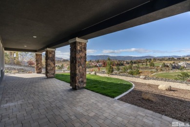 This magnificent 4-bedroom, 3.5-bathroom home in the prestigious on Somersett Country Club in Nevada - for sale on GolfHomes.com, golf home, golf lot