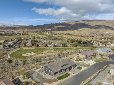 This magnificent 4-bedroom, 3.5-bathroom home in the prestigious on Somersett Country Club in Nevada - for sale on GolfHomes.com, golf home, golf lot