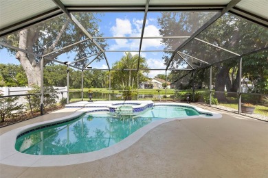 Welcome Home to this stunning Valrico GEM nestled in the highly on Bloomingdale Golfers Club in Florida - for sale on GolfHomes.com, golf home, golf lot