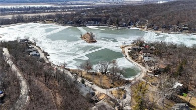 Seeking a lake home in a vibrant, welcoming community? Your on Lake of the Forest Golf Course in Kansas - for sale on GolfHomes.com, golf home, golf lot