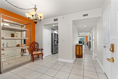 Experience coastal elegance in this impeccably finished on Harbour Village Golf and Yacht Club in Florida - for sale on GolfHomes.com, golf home, golf lot