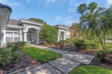 Welcome to this bright and inviting 5-bedroom, 3-bath, and 3-car on Hunters Green Country Club in Florida - for sale on GolfHomes.com, golf home, golf lot