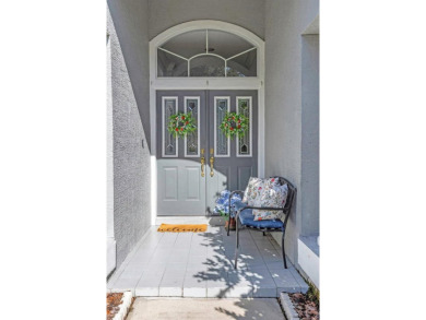 Welcome to this bright and inviting 5-bedroom, 3-bath, and 3-car on Hunters Green Country Club in Florida - for sale on GolfHomes.com, golf home, golf lot