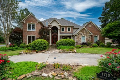 This luxury home w in-ground pool sits on a corner lot alongside on Centennial Valley Golf Course in Arkansas - for sale on GolfHomes.com, golf home, golf lot