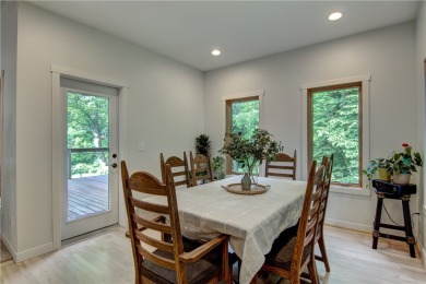 Beautifully maintained home sits on a spacious .69-acre lot on Menomonie Country Club in Wisconsin - for sale on GolfHomes.com, golf home, golf lot
