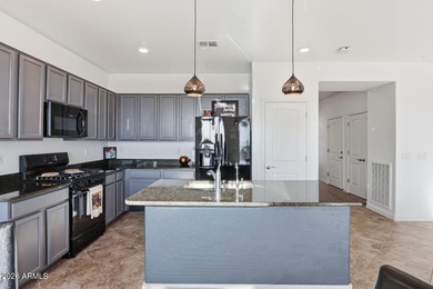 This welcoming bungalow offers low-maintenance desert on Verrado Golf Club - Victory in Arizona - for sale on GolfHomes.com, golf home, golf lot