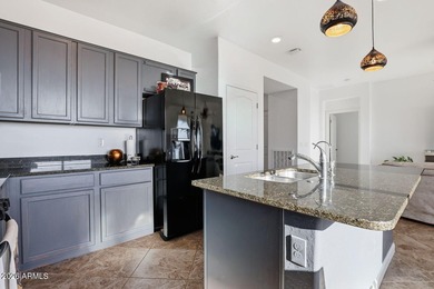 This welcoming bungalow offers low-maintenance desert on Verrado Golf Club - Victory in Arizona - for sale on GolfHomes.com, golf home, golf lot