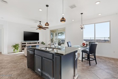 This welcoming bungalow offers low-maintenance desert on Verrado Golf Club - Victory in Arizona - for sale on GolfHomes.com, golf home, golf lot