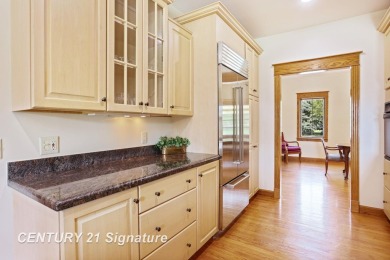 This all brick home, has everything you will need for easy on The Sawmill Golf Club in Michigan - for sale on GolfHomes.com, golf home, golf lot
