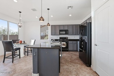 This welcoming bungalow offers low-maintenance desert on Verrado Golf Club - Victory in Arizona - for sale on GolfHomes.com, golf home, golf lot