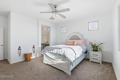 This welcoming bungalow offers low-maintenance desert on Verrado Golf Club - Victory in Arizona - for sale on GolfHomes.com, golf home, golf lot