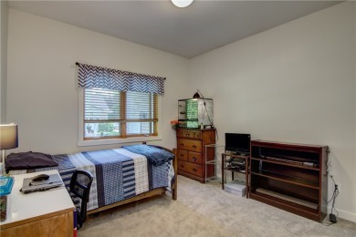 Beautifully maintained home sits on a spacious .69-acre lot on Menomonie Country Club in Wisconsin - for sale on GolfHomes.com, golf home, golf lot