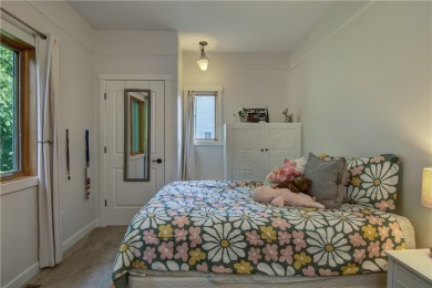 Beautifully maintained home sits on a spacious .69-acre lot on Menomonie Country Club in Wisconsin - for sale on GolfHomes.com, golf home, golf lot