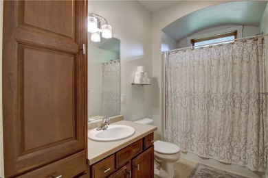 Beautifully maintained home sits on a spacious .69-acre lot on Menomonie Country Club in Wisconsin - for sale on GolfHomes.com, golf home, golf lot