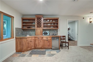 Beautifully maintained home sits on a spacious .69-acre lot on Menomonie Country Club in Wisconsin - for sale on GolfHomes.com, golf home, golf lot