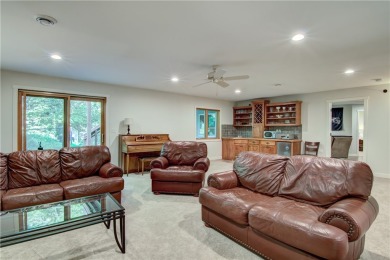 Beautifully maintained home sits on a spacious .69-acre lot on Menomonie Country Club in Wisconsin - for sale on GolfHomes.com, golf home, golf lot