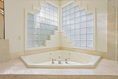 This all brick home, has everything you will need for easy on The Sawmill Golf Club in Michigan - for sale on GolfHomes.com, golf home, golf lot