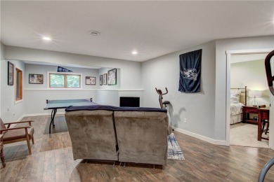 Beautifully maintained home sits on a spacious .69-acre lot on Menomonie Country Club in Wisconsin - for sale on GolfHomes.com, golf home, golf lot