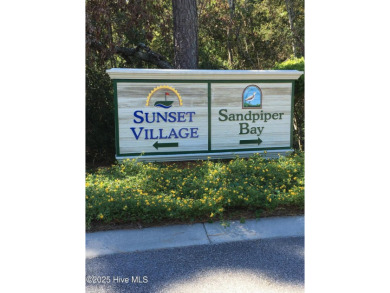 Charming Fixer-Upper with Scenic Golf Views in Sunset Beach!

 on Sandpiper Bay Golf and Country Club in North Carolina - for sale on GolfHomes.com, golf home, golf lot
