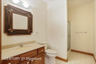 This all brick home, has everything you will need for easy on The Sawmill Golf Club in Michigan - for sale on GolfHomes.com, golf home, golf lot