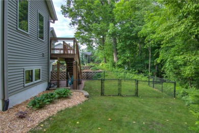 Beautifully maintained home sits on a spacious .69-acre lot on Menomonie Country Club in Wisconsin - for sale on GolfHomes.com, golf home, golf lot