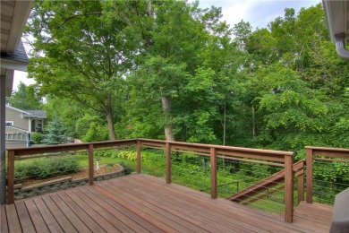 Beautifully maintained home sits on a spacious .69-acre lot on Menomonie Country Club in Wisconsin - for sale on GolfHomes.com, golf home, golf lot