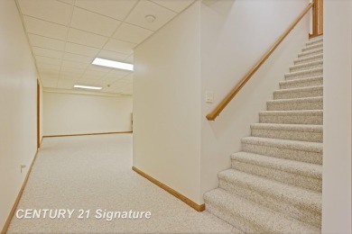 This all brick home, has everything you will need for easy on The Sawmill Golf Club in Michigan - for sale on GolfHomes.com, golf home, golf lot