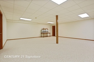 This all brick home, has everything you will need for easy on The Sawmill Golf Club in Michigan - for sale on GolfHomes.com, golf home, golf lot