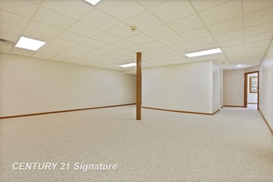 This all brick home, has everything you will need for easy on The Sawmill Golf Club in Michigan - for sale on GolfHomes.com, golf home, golf lot