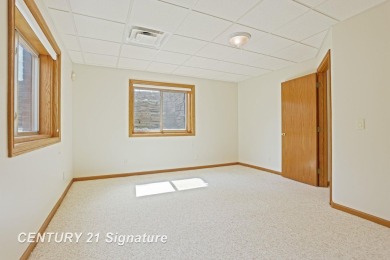 This all brick home, has everything you will need for easy on The Sawmill Golf Club in Michigan - for sale on GolfHomes.com, golf home, golf lot