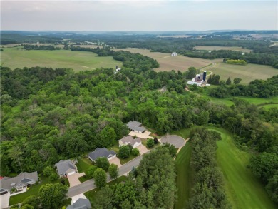 Beautifully maintained home sits on a spacious .69-acre lot on Menomonie Country Club in Wisconsin - for sale on GolfHomes.com, golf home, golf lot