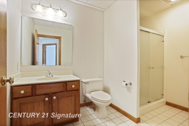 This all brick home, has everything you will need for easy on The Sawmill Golf Club in Michigan - for sale on GolfHomes.com, golf home, golf lot